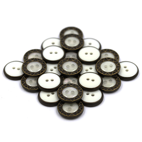 14910 Sullivans 15mm Round Plastic Button 2 Hole White Bordered With Bronze Triangle Pattern - 55 In A Tub