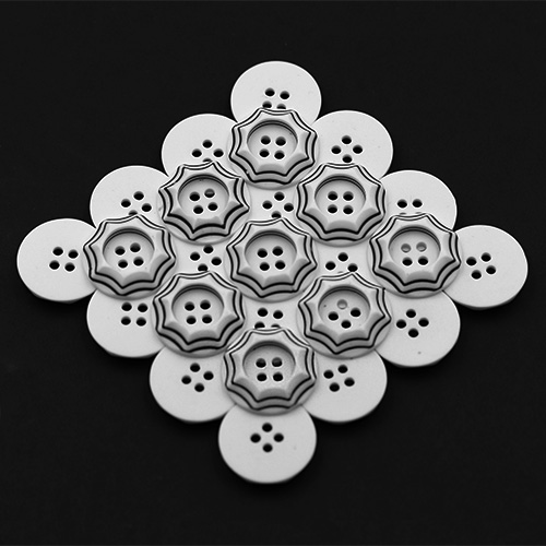 19261 Sullivans 21mm Round Plastic Button 4 Hole - White With Raised Black Borders - 45 In A Tube 