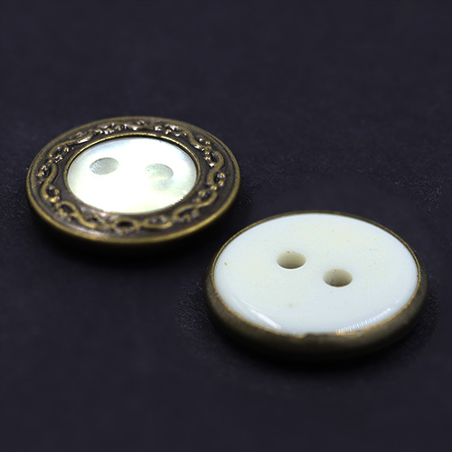 15433 Sullivans 15mm Round Pearl Plastic Button 2 Hole Surrounded With Bronze Detailing - 40 In A Tube 