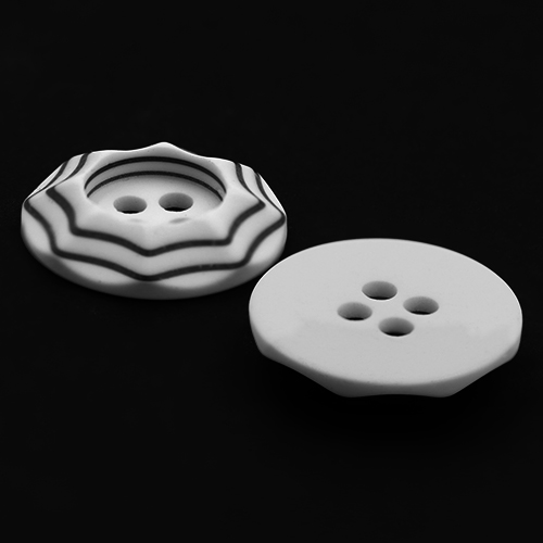 19260 Sullivans 18mm Round Plastic Button 4 Hole - White With Raised Black Borders - 70 In A Tube 