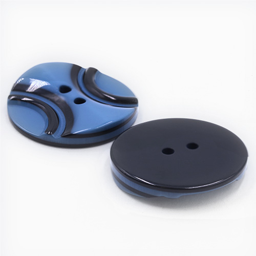 19302 Sullivans 25mm Round Plastic Button 2 Hole With 2 Black Semi Circles - Mid Blue - 35 In A Tube