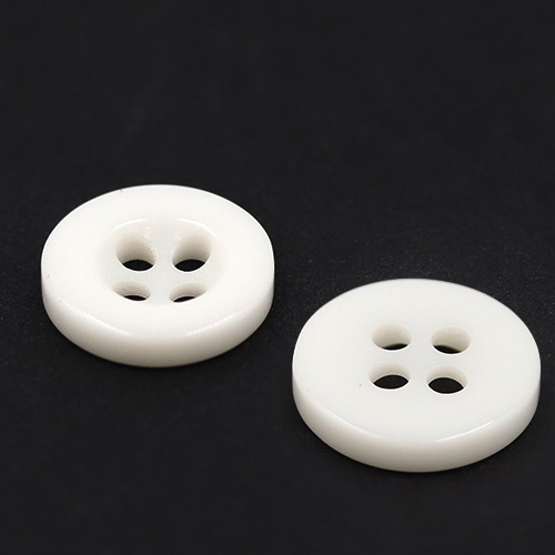 19391 Sullivans 11mm Round Plastic Buttons With Four Holes & Depressed Centre - White - 130 In A Tube