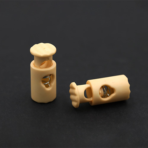 20921 Sullivans 25mm Plastic Cord Ends - Cream - 30 In A Tube