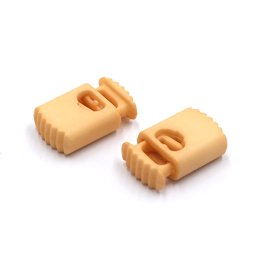 20961 Sullivans 25mm Plastic Cord Ends With Ridged Top - Cream - 34 In A Tube