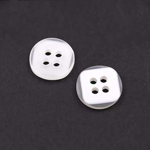 21612 Sullivans 12mm Round Plastic Button 4 Hole - Clear With Frosted White Square Insert - 75 In A Tube 